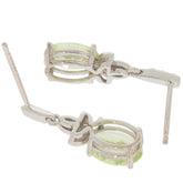 Oval green peridot earrings in 14K white gold with diamond accent, showcasing elegance and luxury.